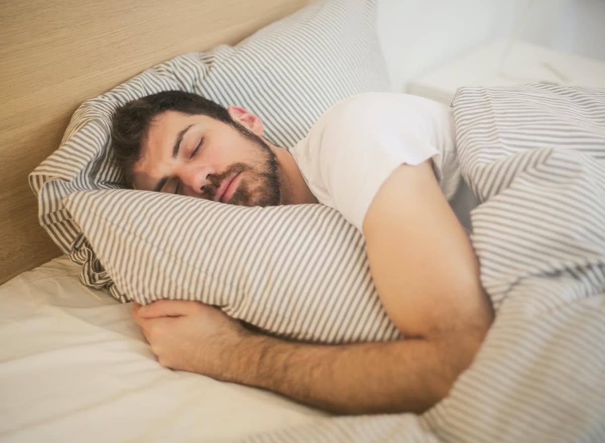 A person sleeping in bed