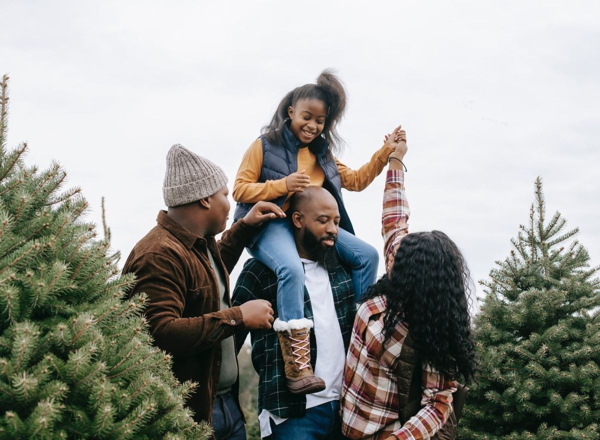 family picking out a christmas tree