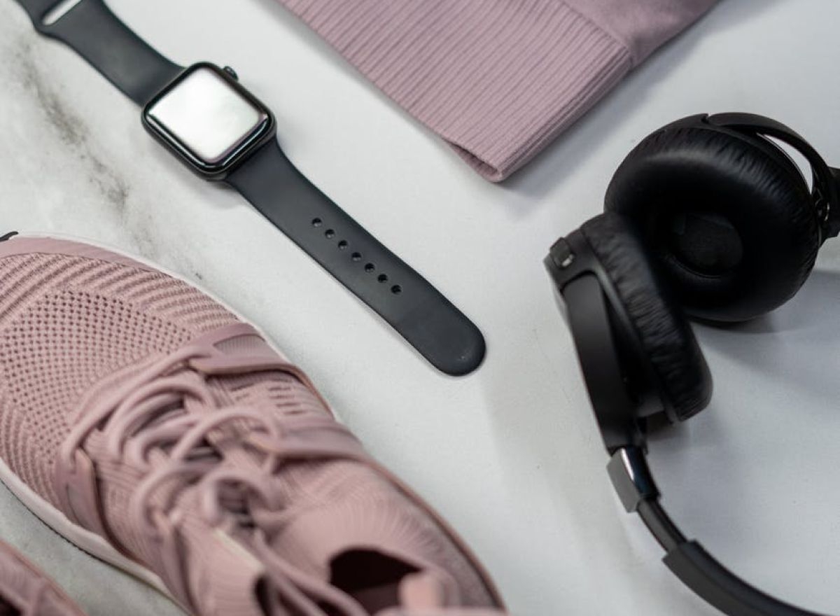 Running shoes, apple watch, and headphones